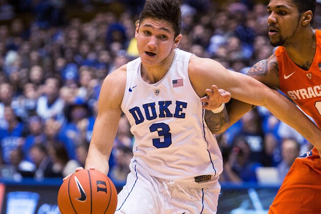 Duke’s Grayson Allen (3) drives as Syracuse’s Michael Gbinije (0) defends during the first half of an NCAA college basketball game at Cameron Indoor Stadium in Durham, N.C. Monday, Jan. 18, 2016. (AP Photo/Ben McKeown)