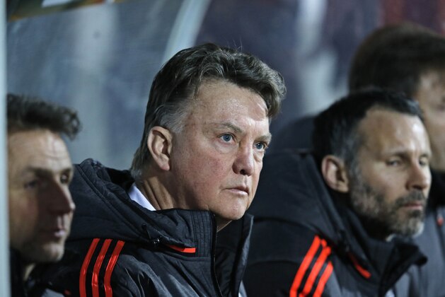 Manchester United's coach Louis van Gaal watches their Europa League round of 32 first leg soccer match against FC Midtjylland at MCH Arena in Herning, Denmark, Thursday, Feb. 18, 2016. (Jens Dresling / Polfoto via AP) DENMARK OUT