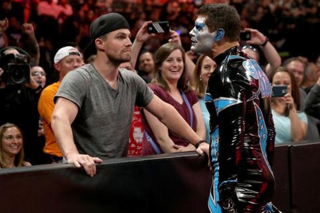 Stardust confronts Stephen Amell during a WWE event