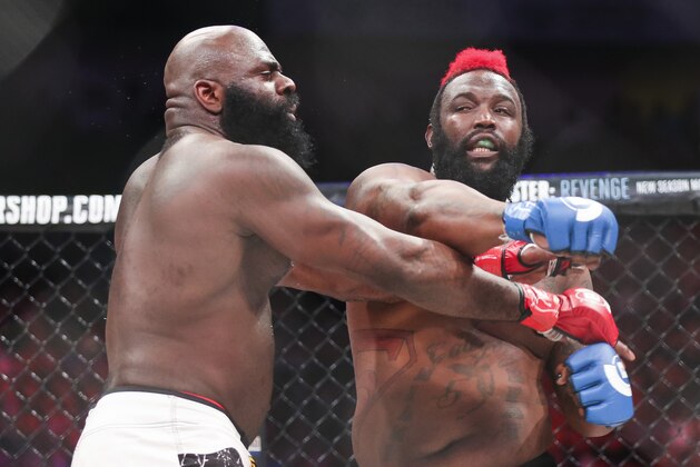 Feb 19, 2016; Houston, TX, USA; Kimbo Slice (red gloves) competes against Dada 5000 (blue gloves) during their Heavyweight fight at Bellator 149 at Toyota Center. Mandatory Credit: Troy Taormina-USA TODAY Sports