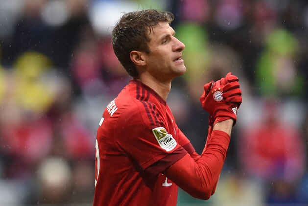 Bayern Munich's striker Thomas Mueller gestures during the German Bundesliga first division football match FC Bayern Munich vs SV Darmstadt 98 in Munich, southern Germany, on February 20, 2016. / AFP / CHRISTOF STACHE / RESTRICTIONS: DURING MATCH TIME: DFL RULES TO LIMIT THE ONLINE USAGE TO 15 PICTURES PER MATCH AND FORBID IMAGE SEQUENCES TO SIMULATE VIDEO. == RESTRICTED TO EDITORIAL USE == FOR FURTHER QUERIES PLEASE CONTACT DFL DIRECTLY AT + 49 69 650050
        (Photo credit should read CHRISTOF STACHE/AFP/Getty Images)