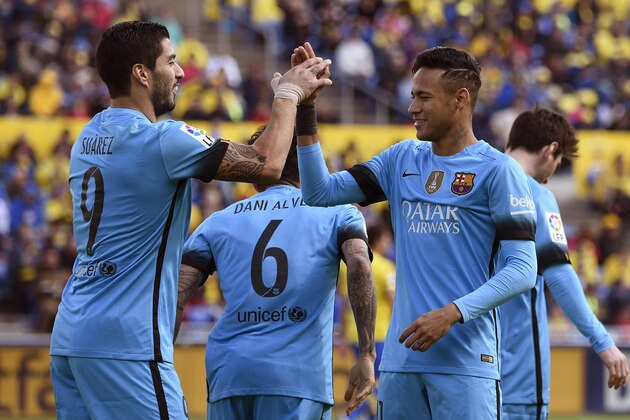 Barcelona's Uruguayan forward Luis Suarez (L) celebrates a goal with Barcelona's Brazilian forward Neymar during the Spanish league football match UD Las Palmas vs FC Barcelona at the Gran Canaria stadium in Las Palmas de Gran Canaria on February 20, 2016. / AFP / DESIREE MARTIN        (Photo credit should read DESIREE MARTIN/AFP/Getty Images)