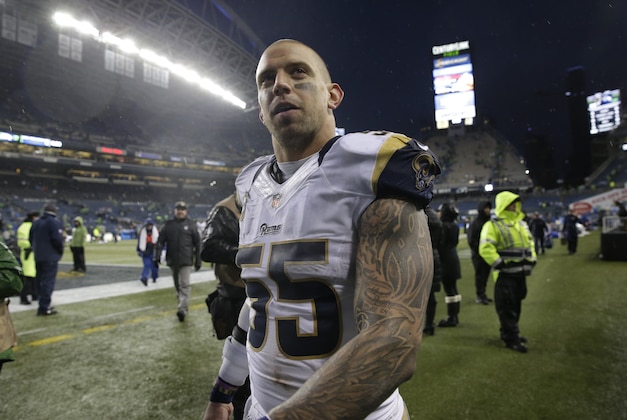 St. Louis Rams middle linebacker James Laurinaitis walks off the field after an NFL football game against the Seattle Seahawks, Sunday, Dec. 27, 2015, in Seattle. The Rams won 23-17. (AP Photo/Stephen Brashear)