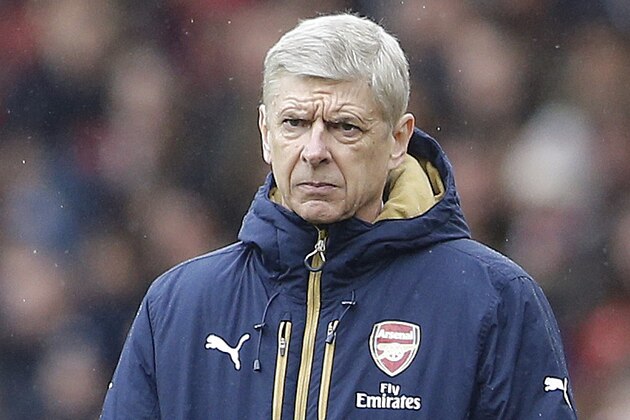 Arsenal's manager Arsene Wenger watches his team during the English FA Cup soccer match between Arsenal and Hull City at the Emirates stadium in London, Saturday, Feb. 20, 2016.(AP Photo/Frank Augstein)