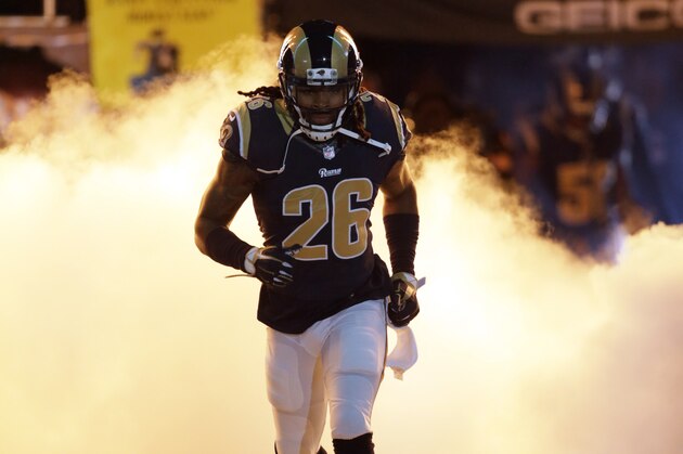 St. Louis Rams strong safety Mark Barron is introduced before the start of an NFL football game between the St. Louis Rams and the Detroit Lions on Sunday, Dec. 13, 2015, in St. Louis. (AP Photo/Tom Gannam)