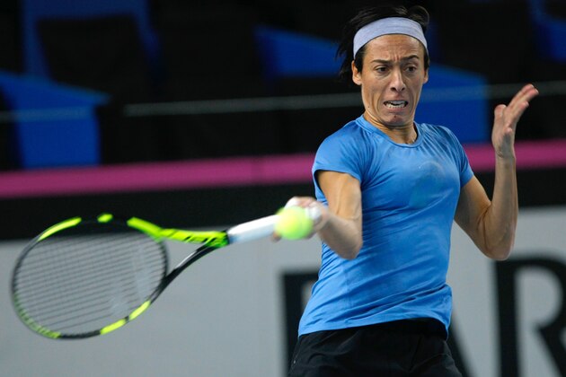 Italy's Francesca Schiavone returns the ball during a training session for the Fed Cup competition in Marseille, southern France, Thursday, Feb.4, 2016. France will face Italy on Feb.6-7 in the first round of the Fed Cup. (AP Photo/Claude Paris)