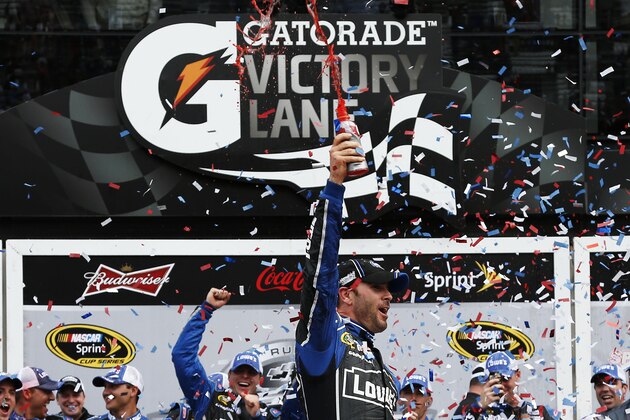 DAYTONA BEACH, FL - FEBRUARY 24:  Jimmie Johnson, driver of the #48 Lowe's Chevrolet, celebrates in victory lane after winning the NASCAR Sprint Cup Series Daytona 500 at Daytona International Speedway on February 24, 2013 in Daytona Beach, Florida.  (Photo by Chris Graythen/Getty Images)