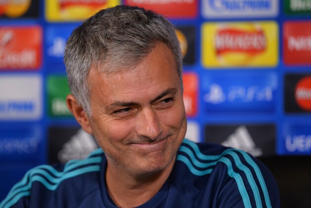 Chelsea's Portuguese manager Jose Mourinho gives a press conference on the eve of a UEFA Champions League, group G football match against Porto at Chelsea's training ground in Cobham, south west London on December 8, 2015. 
AFP PHOTO / GLYN KIRK / AFP / GLYN KIRK        (Photo credit should read GLYN KIRK/AFP/Getty Images)