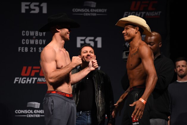 PITTSBURGH, PA - FEBRUARY 20:  (L-R) Donald Cerrone of the United States faces off against Alex Oliveira of Brazil during the UFC Fight Night weigh-in at Stage AE on February 20, 2016 in Pittsburgh, Pennsylvania. (Photo by Jeff Bottari/Zuffa LLC/Zuffa LLC via Getty Images)