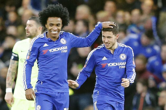 Chelsea's Willian, left, and teammate Eden Hazard celebrate after scoring during the English FA Cup soccer match between Chelsea and Manchester City at the Stamford Bridge stadium in London, Sunday, Feb. 21, 2016.(AP Photo/Frank Augstein)