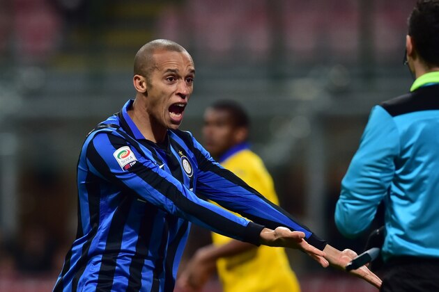 Inter Milan's Brazilian defender Joao Miranda celebrates after scoring a goal during the Italian Serie A football match between Inter Milan and Sampdoria at San Siro Stadium in Milan on Febrauary 20, 2016. / AFP / GIUSEPPE CACACE        (Photo credit should read GIUSEPPE CACACE/AFP/Getty Images)