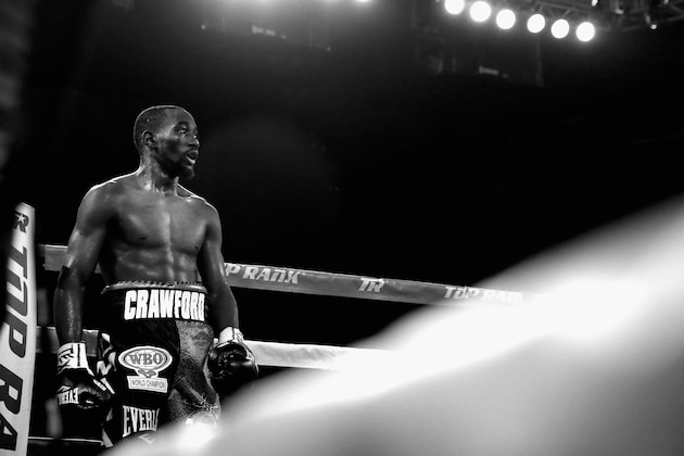 ARLINGTON, TX - APRIL 18: (Editors Note: This image has been converted to black & white) Terence Crawford reacts after beating Thomas Dulorme of Puerto Rico in the sixth round in their WBO Jr. Welterweight Title Bout on April 18, 2015 at College Park Center in Arlington, Texas.  (Photo by Tom Pennington/Getty Images)