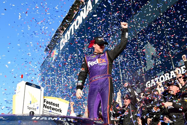 DAYTONA BEACH, FL - FEBRUARY 21:  Denny Hamlin, driver of the #11 FedEx Express Toyota, celebrates in Victory Lane after winning the NASCAR Sprint Cup Series DAYTONA 500 at Daytona International Speedway on February 21, 2016 in Daytona Beach, Florida.  (Photo by Jared C. Tilton/Getty Images)