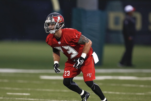 TAMPA, FL - AUGUST 1: Cornerback Chris Conte #23 of the Tampa Bay Buccaneers works out during the first day of Training Camp at the University of South Florida on August 1, 2015 in Tampa, Florida. (Photo by Don Juan Moore/Getty Images)