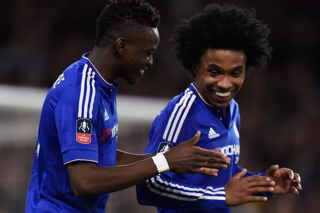 LONDON, ENGLAND - FEBRUARY 21:  Bertrand Traore of Chelsea celebrates with teammate Willian (R) after scoring his team's fifth goal during The Emirates FA Cup fifth round match between Chelsea and Manchester City at Stamford Bridge on February 21, 2016 in London, England.  (Photo by Mike Hewitt/Getty Images)