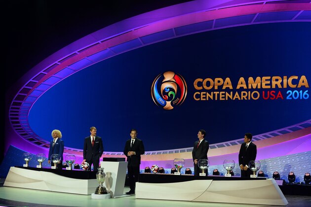 (L-R) Carlos Valderrama, Alexi Lalas, CONCACAF deputy general Jurgen Mainka, Mario Kempes and Juan Carlos Osorio prepare the drawing for the Copa America Centenario 2016 championship at the Hammerstein Ballroom in New York on February 21, 2016. 
The Copa America Centenario, a once-in-a-lifetime soccer summer event, which honors 100 years of the Copa America tournament, will take place in the US from June 3-26, 2016. / AFP / Mladen ANTONOV        (Photo credit should read MLADEN ANTONOV/AFP/Getty Images)