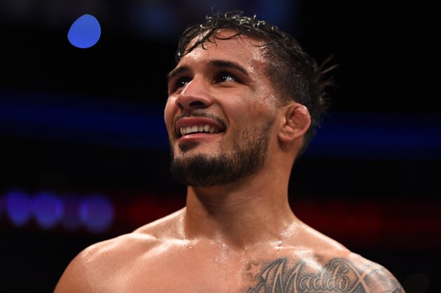 PITTSBURGH, PA - FEBRUARY 21:  Dennis Bermudez celebrates his victory over Tatsuya Kawajiri in their featherweight bout during the UFC Fight Night event at Consol Energy Center on February 21, 2016 in Pittsburgh, Pennsylvania. (Photo by Jeff Bottari/Zuffa LLC/Zuffa LLC via Getty Images)