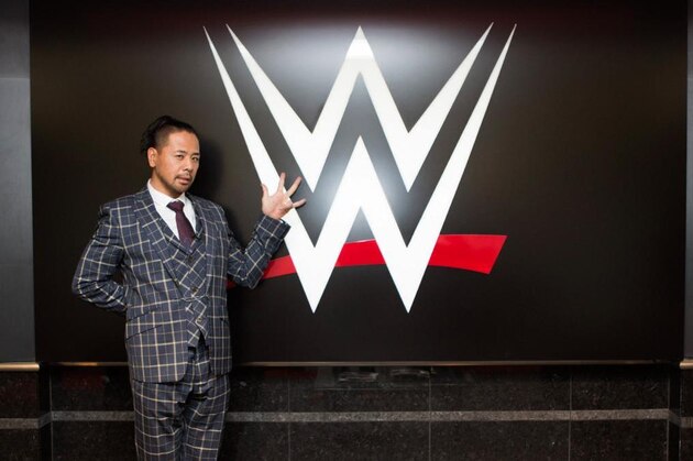 NEW YORK - MARCH 18:  The World Wrestling Entertainment logo hangs on a wall at a media conference announcing the all-star lineup of WWE WrestleMania XIX at ESPN Zone in Times Square March 18, 2003 in New York City.  (Photo by Mark Mainz/Getty Images)
