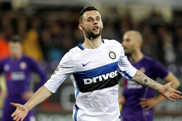 Inter's Marcelo Brozovic celebrates after scoring during a Serie A soccer match between Fiorentina and Inter Milan at the Artemio Franchi stadium in Florence, Italy, Sunday, Feb. 14, 2016. (AP Photo/Fabrizio Giovannozzi)