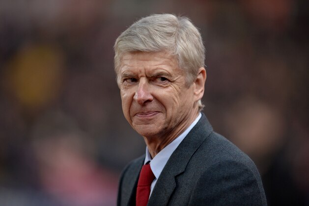 Arsenal's French manager Arsene Wenger reacts ahead of the English Premier League football match between Stoke City and Arsenal at the Britannia Stadium in Stoke-on-Trent, central England on January 17, 2016. AFP PHOTO / OLI SCARFF

RESTRICTED TO EDITORIAL USE. No use with unauthorized audio, video, data, fixture lists, club/league logos or 'live' services. Online in-match use limited to 75 images, no video emulation. No use in betting, games or single club/league/player publications.. / AFP / OLI SCARFF        (Photo credit should read OLI SCARFF/AFP/Getty Images)