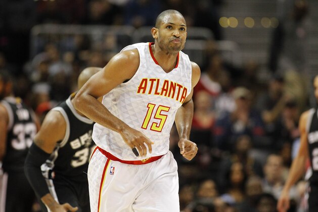 Atlanta Hawks center Al Horford (15) in action in the first half of an NBA basketball game against the San Antonio Spurs, Saturday, Dec. 12, 2015, in Atlanta. (AP Photo/Brett Davis)