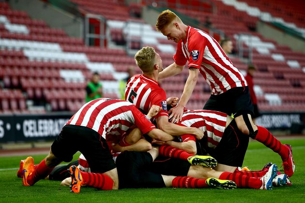 SOUTHAMPTON, ENGLAND - APRIL 20: Ryan Seager of Southampton is mobbed by his teamates after scoring to make it 1-0 during the Under 21 Premier League Cup Final Second Leg match between Southampton and Blackburn Rovers at St Mary's Stadium on April 20, 2015 in Southampton, England. (Photo by Jordan Mansfield/Getty Images) SOUTHAMPTON, ENGLAND - APRIL 20: Ryan Seager of Southampton is mobbed by his teamates after scoring to make it 1-0 during the Under 21 Premier League Cup Final Second Leg match between Southampton and Blackburn Rovers at St Mary's Stadium on April 20, 2015 in Southampton, England. (Photo by Jordan Mansfield/Getty Images)