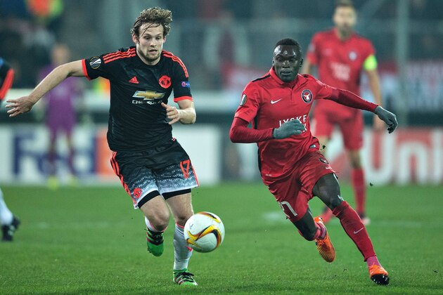 Manchester United's Dutch midfielder Daley Blind (L) and FC Midtjylland's forward Pione Sisto vie for the ball during the UEFA Europa League Round of 32 football match between Manchester United and FC Midtjylland in Hernin on February 18, 2016. / AFP / Scanpix Denmark / Henning Bagger / Denmark OUT (Photo credit should read HENNING BAGGER/AFP/Getty Images) Manchester United's Dutch midfielder Daley Blind (L) and FC Midtjylland's forward Pione Sisto vie for the ball during the UEFA Europa League Round of 32 football match between Manchester United and FC Midtjylland in Hernin on February 18, 2016. / AFP / Scanpix Denmark / Henning Bagger / Denmark OUT (Photo credit should read HENNING BAGGER/AFP/Getty Images)