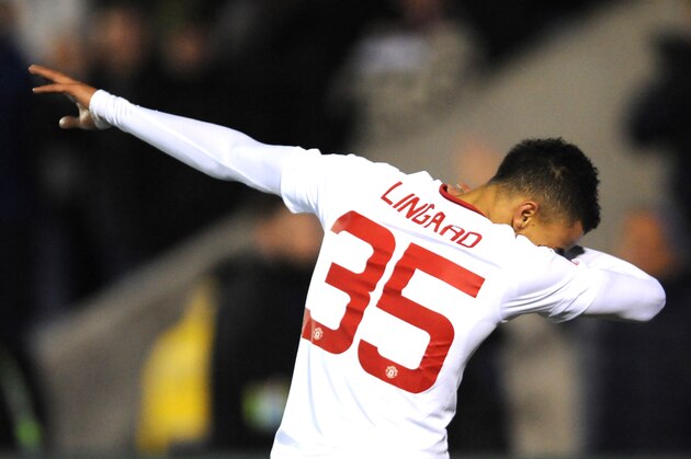 Manchester United’s Jesse Lingard celebrates after scoring during the English FA Cup fifth round soccer match between Shrewsbury Town and Manchester United at Greenhous Meadow stadium in Shrewsbury, England, Monday, Feb. 22, 2016. (AP Photo/Rui Vieira)