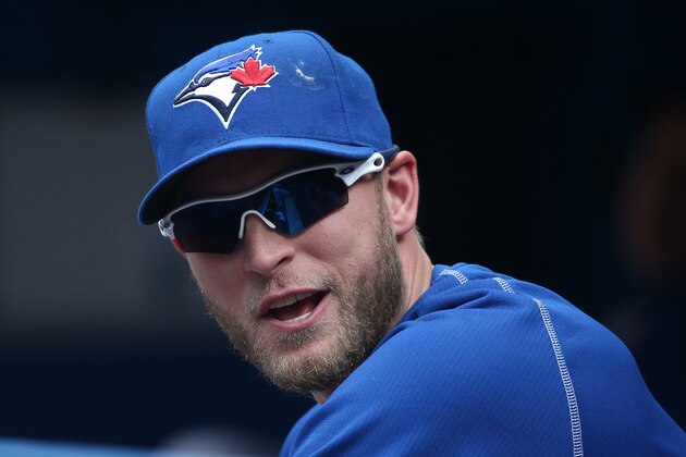 TORONTO, CANADA - MAY 24: Michael Saunders #21 of the Toronto Blue Jays looks on from the dugout during MLB game action against the Seattle Mariners on May 24, 2015 at Rogers Centre in Toronto, Ontario, Canada. (Photo by Tom Szczerbowski/Getty Images)