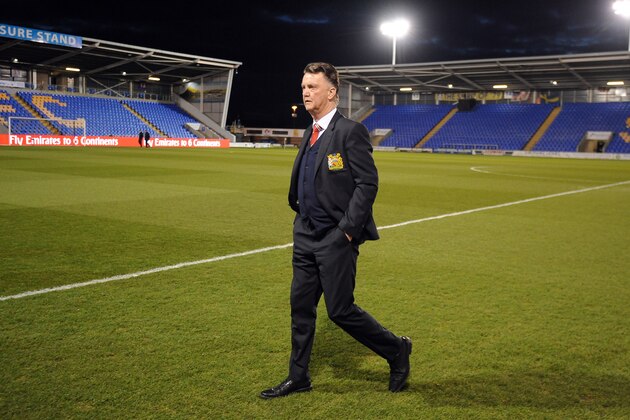 Manchester United's manager Louis van Gaal arrives at the stadium before the English FA Cup fifth round soccer match between Shrewsbury Town and Manchester United at Greenhous Meadow stadium in Shrewsbury, England, Monday, Feb. 22, 2016. (AP Photo/Rui Vieira)