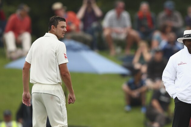 CHRISTCHURCH, NEW ZEALAND - FEBRUARY 23: Josh Hazlewood of Australia has words with Corey Anderson of New Zealand  during day four of the Test match between New Zealand and Australia at Hagley Oval on February 23, 2016 in Christchurch, New Zealand.  (Photo by Ryan Pierse/Getty Images)