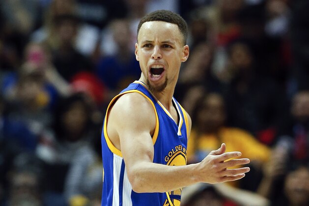 Golden State Warriors guard Stephen Curry (30) reacts after being charged with a foul in the first half of an NBA basketball game against the Atlanta Hawks, Monday, Feb. 22, 2016, in Atlanta. (AP Photo/John Bazemore)