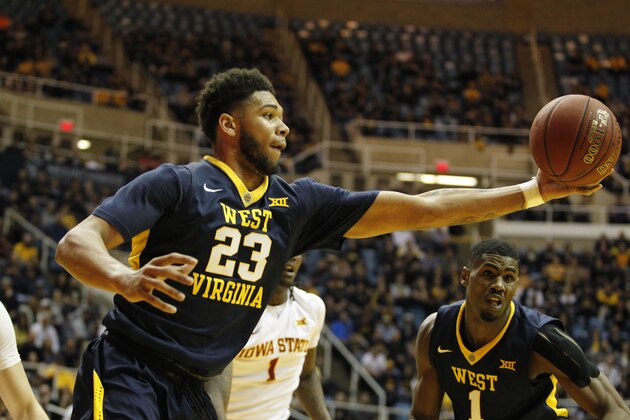 MORGANTOWN, WV - FEBRUARY 22:  Esa Ahmad #23 of the West Virginia Mountaineers pulls down a rebound during the game against the Iowa State Cyclones at the WVU Coliseum on February 22, 2016 in Morgantown, West Virginia.  (Photo by Justin K. Aller/Getty Images)