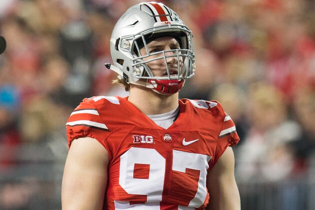 Nov 7, 2015; Columbus, OH, USA; Ohio State Buckeyes defensive lineman Joey Bosa (97) waits for the Minnesota Golden Gophers to break the huddle at Ohio Stadium. Ohio State won the game 28-14. Mandatory Credit: Greg Bartram-USA TODAY Sports