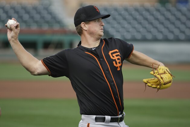 San Francisco Giants starting pitcher Matt Cain throws during practice before the spring baseball season in Scottsdale, Ariz., Thursday, Feb. 18, 2016. (AP Photo/Chris Carlson)