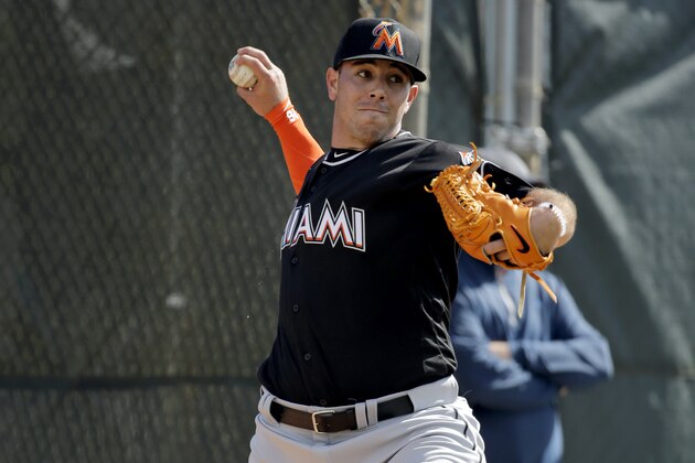 Miami Marlins pitcher Jose Fernandez throws a bullpen session during spring training baseball practice Monday, Feb. 22, 2016, in Jupiter, Fla. (AP Photo/Jeff Roberson)