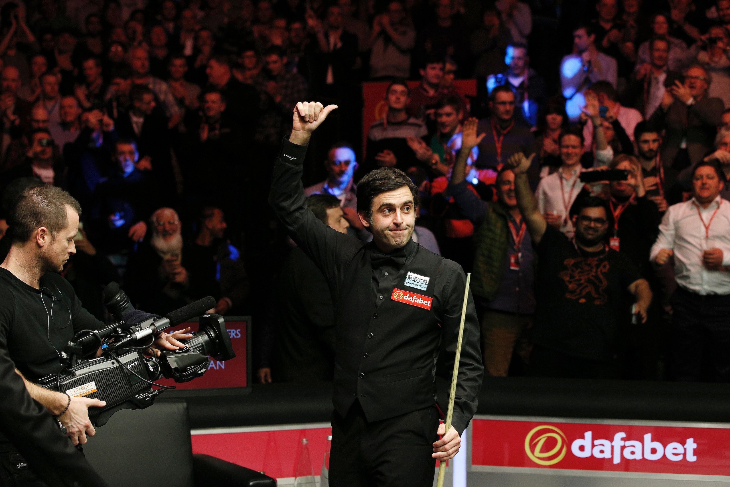 England's Ronnie O'Sullivan reacts after winning the frame to win the match and defeat England's Barry Hawkins (not pictured) in the Masters Snooker final at Alexandra Palace in north London on January 17, 2016. O'Sullivan overwhelmed Barry Hawkins 10-1 to win the final of the Masters snooker tournament at London's Alexandra Palace on Sunday.  AFP PHOTO / ADRIAN DENNIS / AFP / ADRIAN DENNIS        (Photo credit should read ADRIAN DENNIS/AFP/Getty Images)
