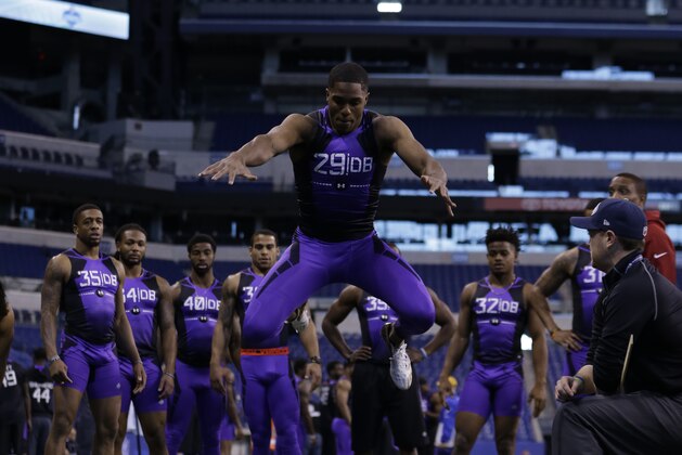 Connecticut defensive back Byron Jones runs a drill at the NFL football scouting combine in Indianapolis, Monday, Feb. 23, 2015. (AP Photo/Julio Cortez)