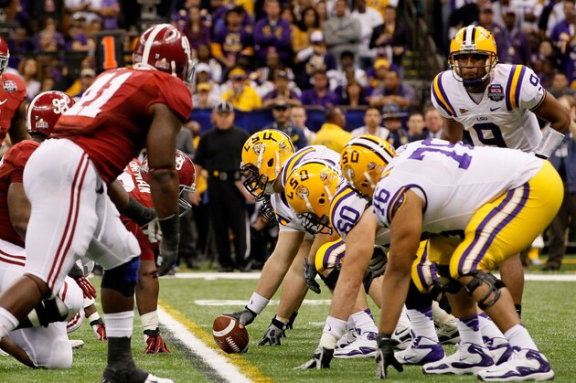 NEW ORLEANS, LA - JANUARY 09:  Jordan Jefferson #9 and the Louisiana State University Tigers line up against the Alabama Crimson Tide during the 2012 Allstate BCS National Championship Game at Mercedes-Benz Superdome on January 9, 2012 in New Orleans, Louisiana.  (Photo by Kevin C. Cox/Getty Images)
