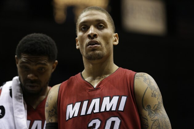 Miami Heat's Michael Beasley looks up during an NBA basketball game against the Milwaukee Bucks Tuesday, March 24, 2015, in Milwaukee. (AP Photo/Aaron Gash)