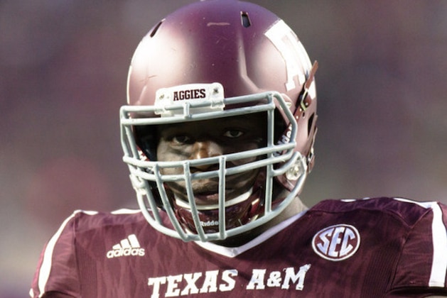 Texas A&M's offensive lineman Germain Ifedi (74) on the field warms up before an NCAA college football game against Western Carolina, Saturday, Nov. 14, 2015, in College Station, Texas. (AP Photo/Juan DeLeon)