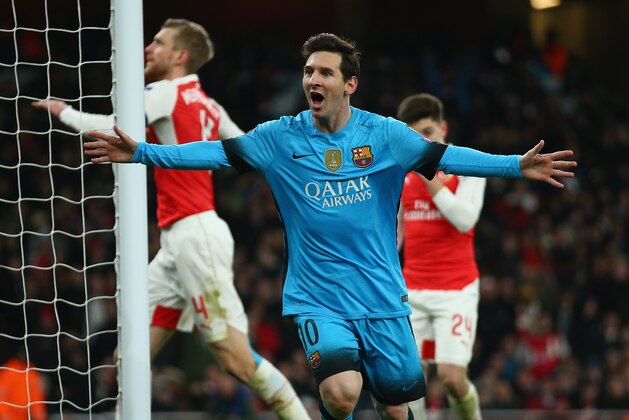 LONDON, ENGLAND - FEBRUARY 23: Lionel Messi of Barcelona celebrates after scoring the opening goal  during the UEFA Champions League round of 16 first leg match between Arsenal and Barcelona on February 23, 2016 in London, United Kingdom.  (Photo by Paul Gilham/Getty Images)