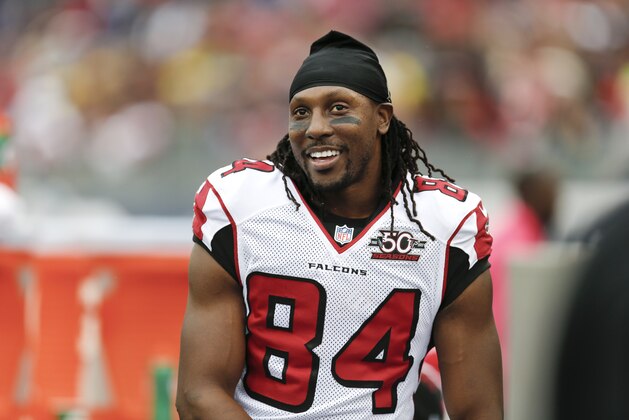 Atlanta Falcons wide receiver Roddy White watches from the sideline in the second half of an NFL football game against the Tennessee Titans Sunday, Oct. 25, 2015, in Nashville, Tenn. (AP Photo/Weston Kenney)