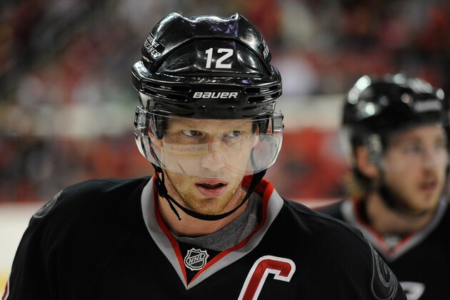 RALEIGH, NC - MARCH 16:  Eric Staal #12 of the Carolina Hurricanes against the Edmonton Oilers during their game at PNC Arena on March 16, 2014 in Raleigh, North Carolina. The Oilers won 2-1.  (Photo by Grant Halverson/Getty Images)