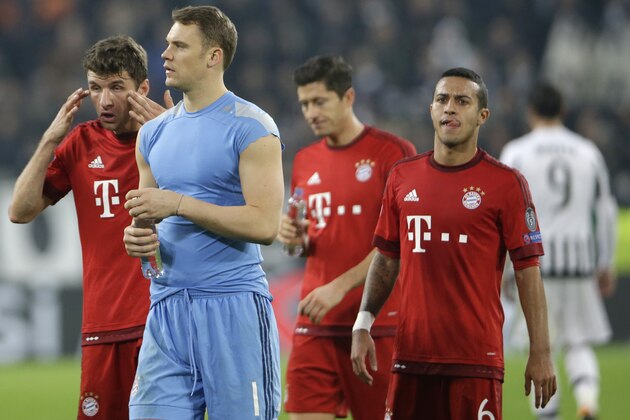 Bayern's Thomas Mueller, Manuel Neuer, Robert Lewandowski and Thiago Alcantara, from left, leave the pitch after the Champions League, round of 16, first-leg soccer match between Juventus and Bayern Munich at the Juventus stadium in Turin, Italy, Tuesday, Feb. 23, 2016. (AP Photo/Luca Bruno)