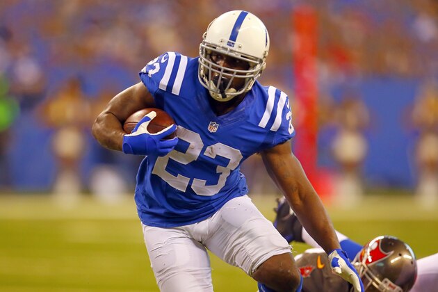 Indianapolis Colts running back Frank Gore (23) runs the ball against the Tampa Bay Buccaneers during an NFL football game in Indianapolis, Sunday, Nov. 29, 2015.  (Jeff Haynes/AP Images for Panini)