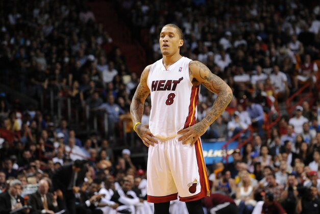 Jan 2, 2014; Miami, FL, USA; Miami Heat small forward Michael Beasley (8) looks on during the second half against the Golden State Warriors at American Airlines Arena. Mandatory Credit: Steve Mitchell-USA TODAY Sports