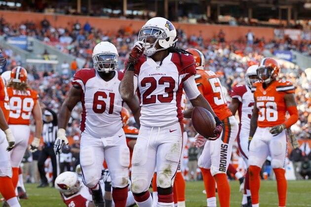 Arizona Cardinals running back Chris Johnson (23) celebrates an apparent touchdown against the Cleveland Browns but the play was called back due to a penalty during an NFL football game Sunday, Nov. 1, 2015, in Cleveland. Arizona won 34-20. (Jeff Haynes/AP Images for Panini)