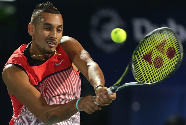 Nick Kyrgios from Australia returns the ball to Martin Klizan from Slovakia during a second day match of the Dubai Tennis Championships in Dubai, United Arab Emirates, Tuesday, Feb. 23, 2016. (AP Photo/Kamran Jebreili) Nick Kyrgios from Australia returns the ball to Martin Klizan from Slovakia during a second day match of the Dubai Tennis Championships in Dubai, United Arab Emirates, Tuesday, Feb. 23, 2016. (AP Photo/Kamran Jebreili)
