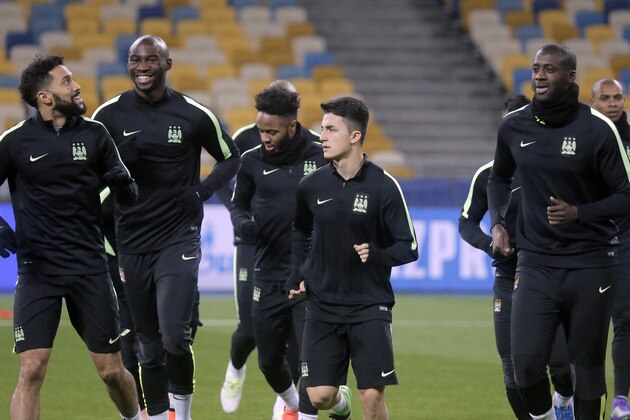 Manchester City players attend a training session at Olimpiyskiy Stadium in Kiev, Ukraine, Tuesday Feb. 23, 2016. Manchester City and Dynamo Kiev will play on Wednesday in a Champions League, Round of 16, first leg soccer match in Kiev. (AP Photo/Efrem Lukatsky)